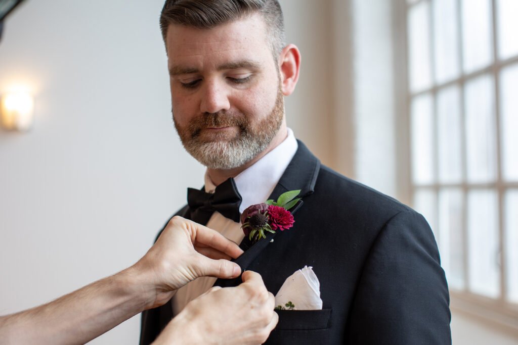 man with boutonniere