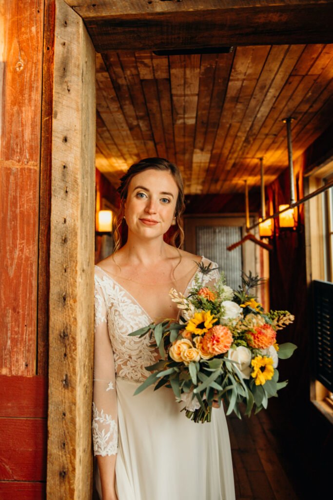 bride holding flowers