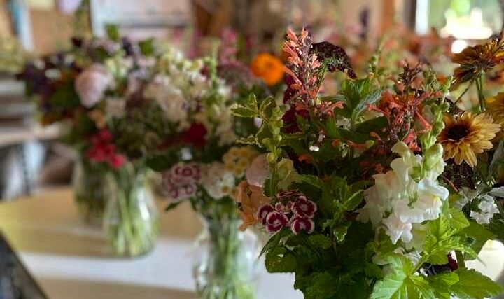 flowers in vases on a table