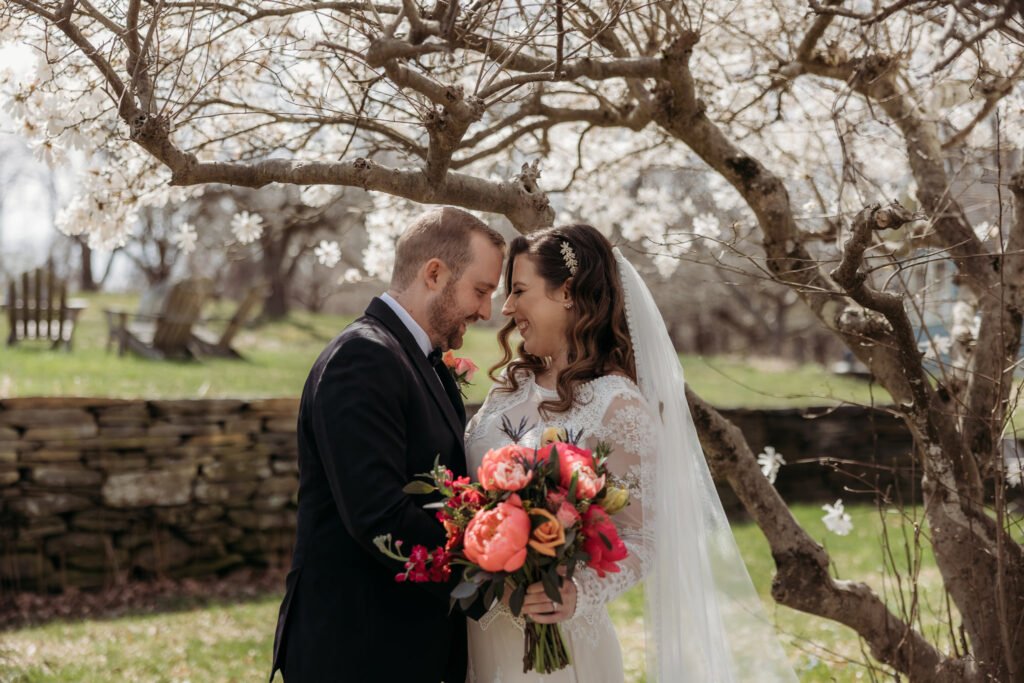 Bride a groom, bright wedding flowers, Haydenville, MA. Valley View Farm