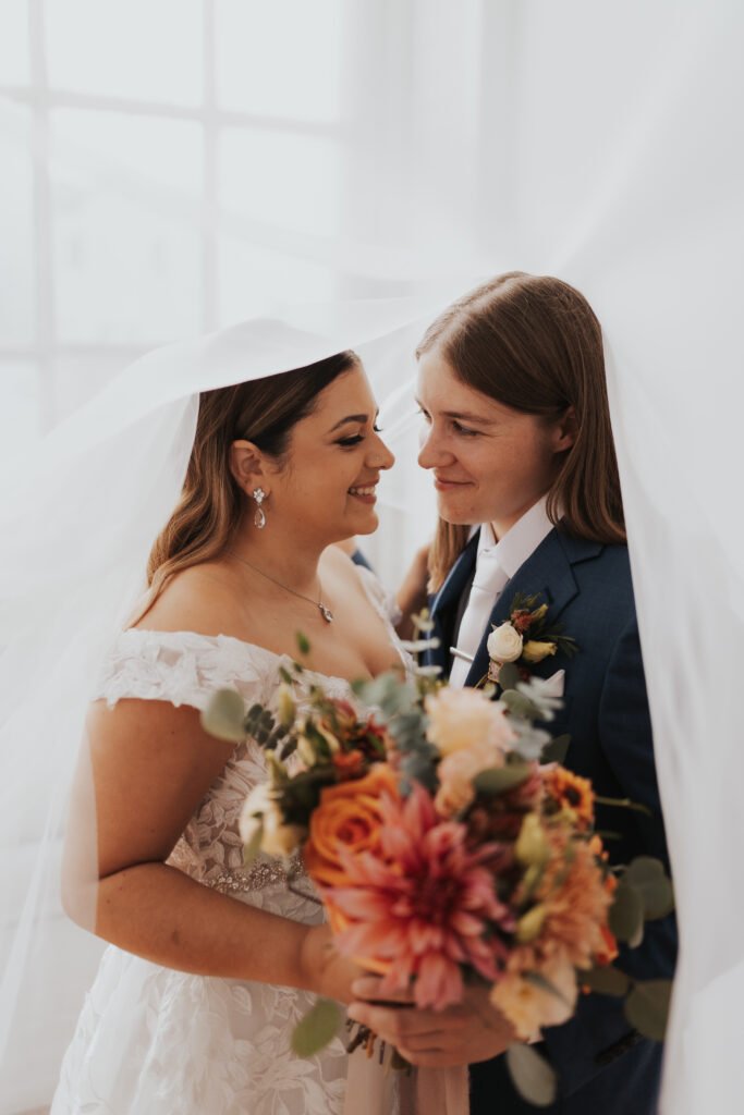 bride and bride, terracotta wedding flowers