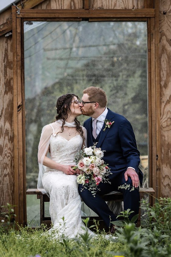 bride and groom kissing