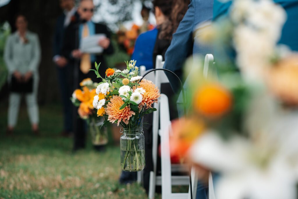 aisle flowers at wedding ceremony