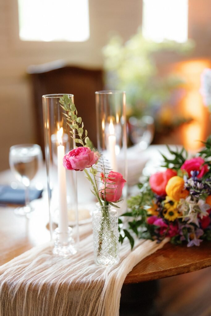 candles and flowers on a table
